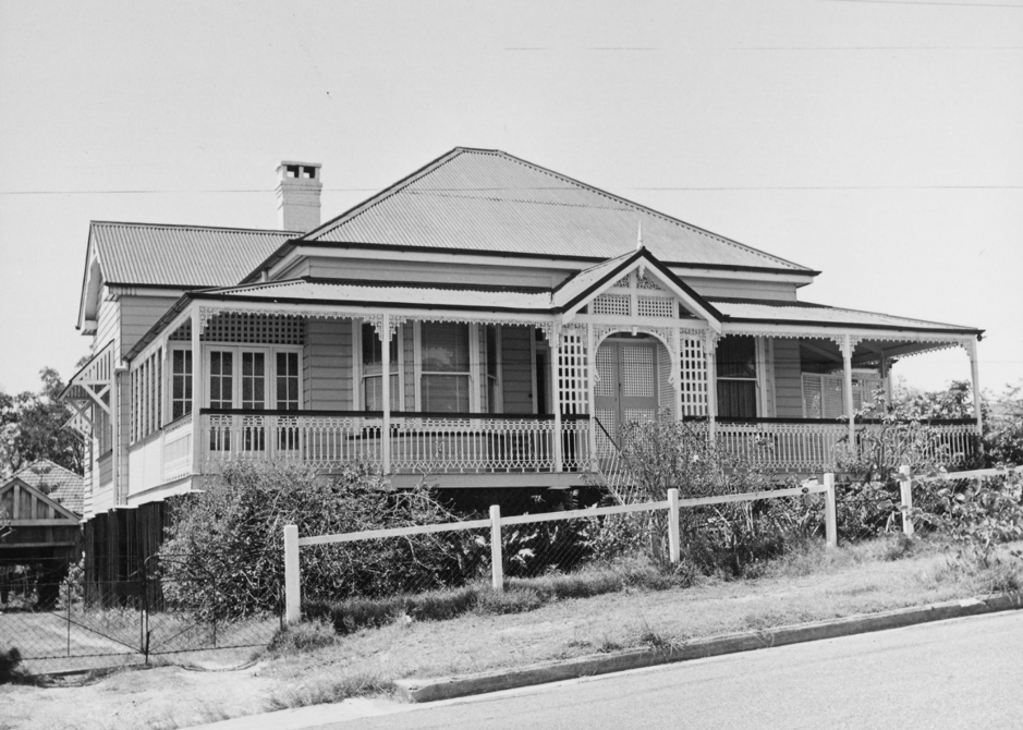 Picture of a Queenslander house with lattice work and a verandah